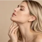 Woman touching her chin and jawline area for Endolift facial rejuvenation consultation